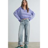 Person rocking a purple striped cropped sweater and light wash wide-leg jeans, perfect stylish womens clothes