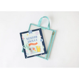 Mint green tote with Scissor Skills workbook from the Space Scissor Skills Activity Kit