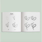 Open book showing a tulip drawing tutorial for fun Spring Things drawing lessons