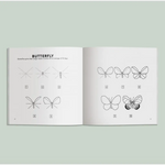 Open book with butterfly drawing tutorial from Spring Things drawing lessons for kids