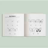 Open book with butterfly drawing tutorial from Spring Things drawing lessons for kids