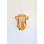 Stay Kind Organic Baby Onesie in yellow made from soft organic cotton fabric