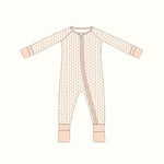 Cute baby sleeper with diagonal zipper, pink cuffs, and subtle pattern, perfect bamboo baby sleeper