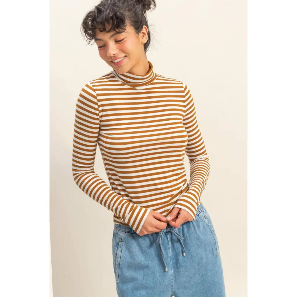 Striped turtleneck sweater in brown and white with drawstring waistband