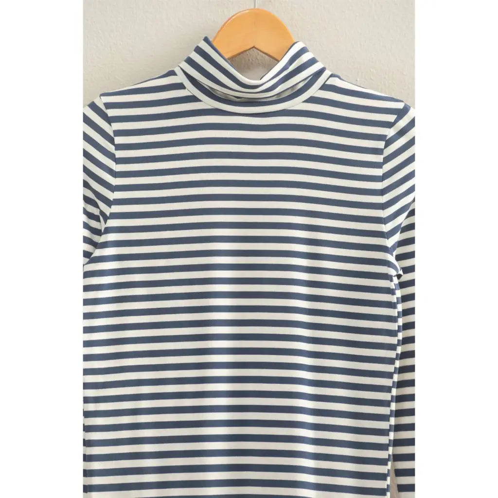 Navy and white striped turtleneck sweater in stylish womens clothes