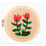Floral punch needle embroidery in hoop from Summer Tulips Punch Needle Kit, perfect for stylish womens clothes