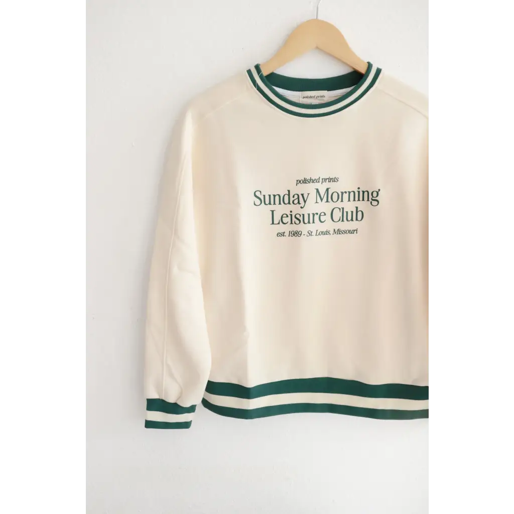 Cream sweatshirt with green stripes, perfect for Sunday Morning Leisure Club vibes