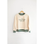 Cream sweatshirt with green trim featuring Sunday Morning Leisure Club design