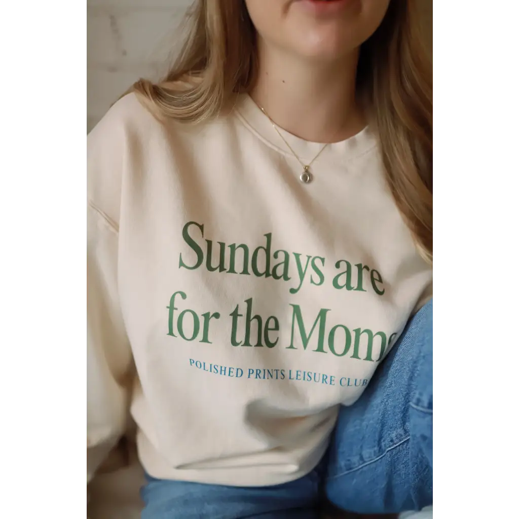 Cream-colored Sundays Are For The Moms sweatshirt with sage green text
