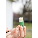 Sweet Mint Organic Lip Balm green tube with yellow balm top