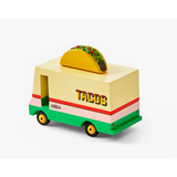 Toy taco truck with a fun taco on top, capturing the food truck vibe perfectly!