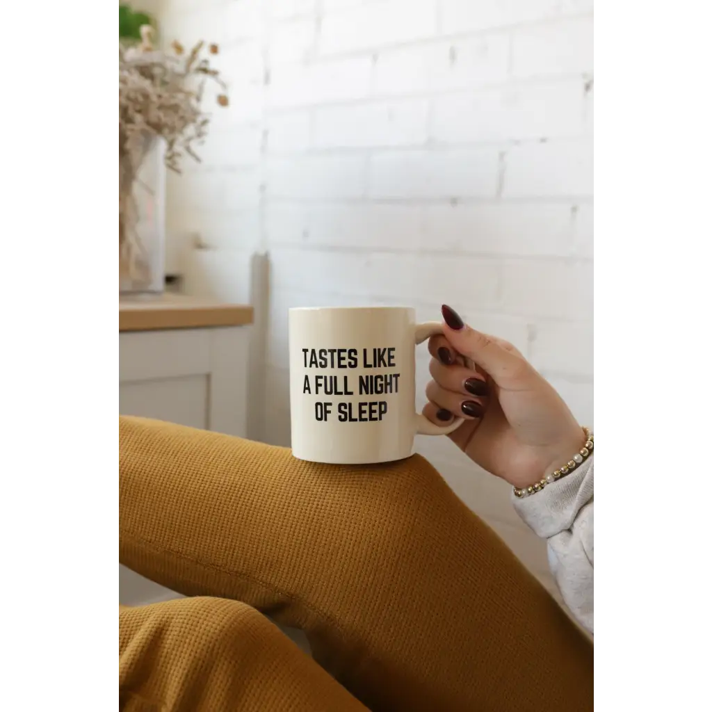 Cream-colored ceramic night sleep mug with handle from Tastes Like a Full Night Sleep Mug