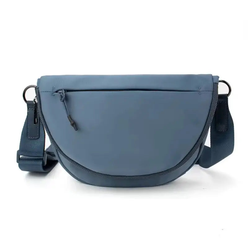 Blue half-moon shaped Adventure Crossbody Bag in Navy perfect for on-the-go style