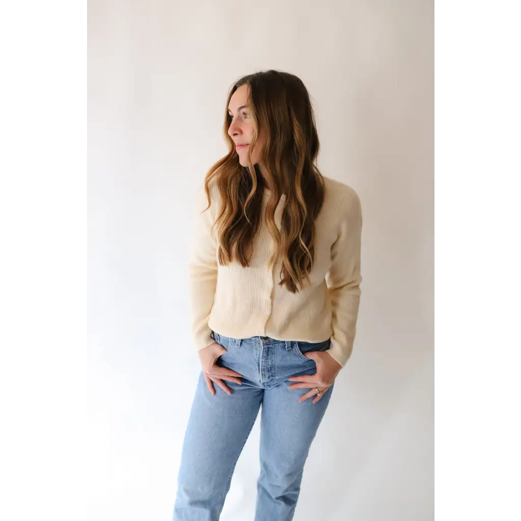 Casual outfit showing the Annie Cardigan Sweater with light-wash jeans and cream colors