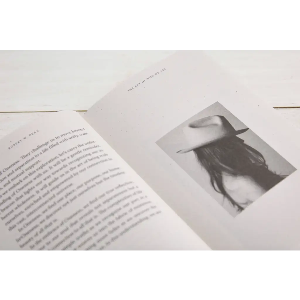 Open book showcasing text and black and white photo from The Art of Who We Are