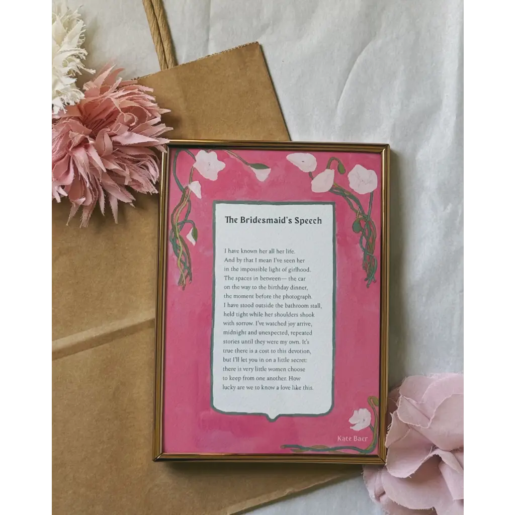 Gold frame wall art print with pink background and floral design, free shipping available