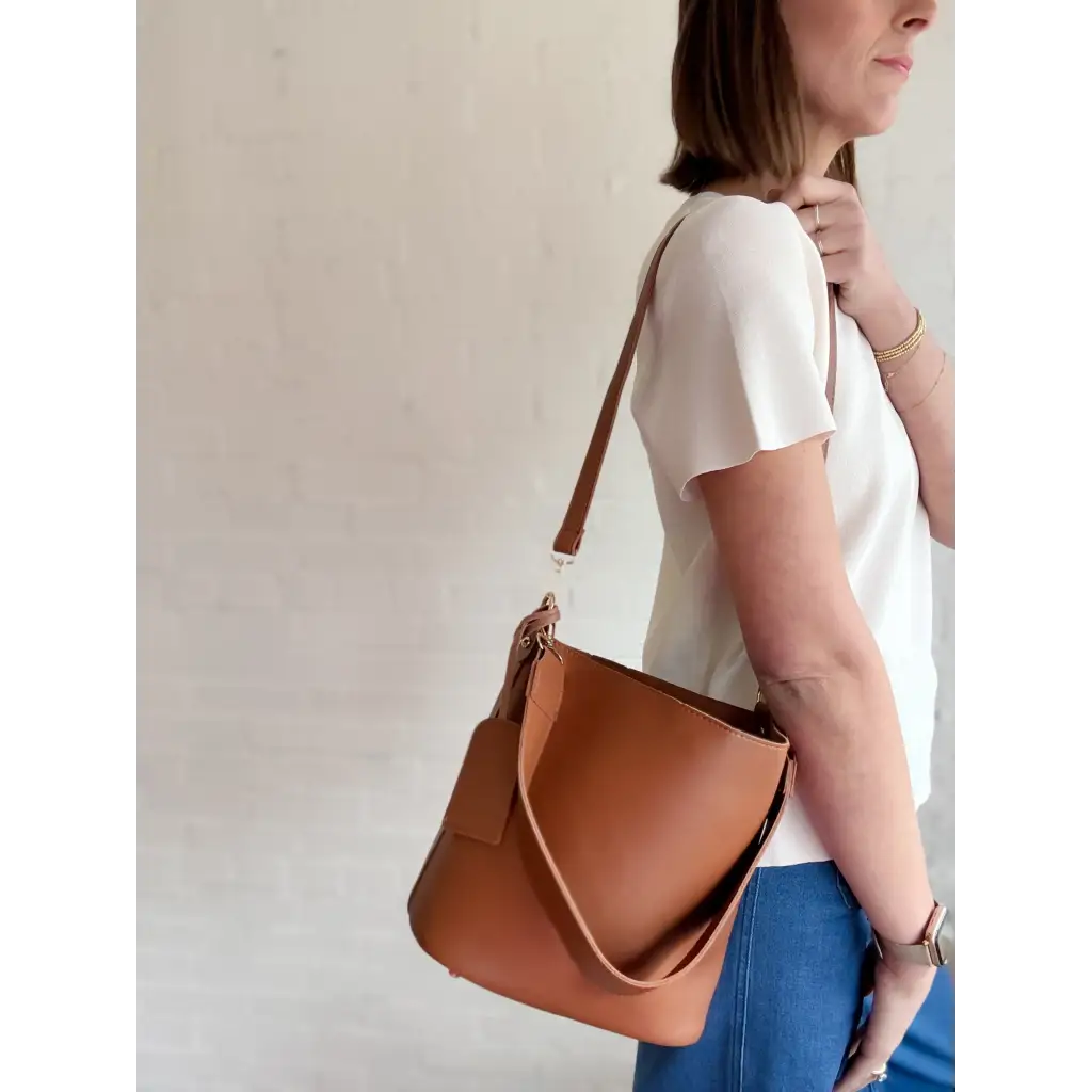 Brown leather bucket bag from The Brooke, perfect everyday bucket bag for stylish outings