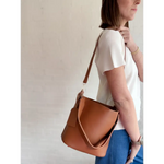 Brown leather bucket bag from The Brooke, perfect everyday bucket bag for stylish outings