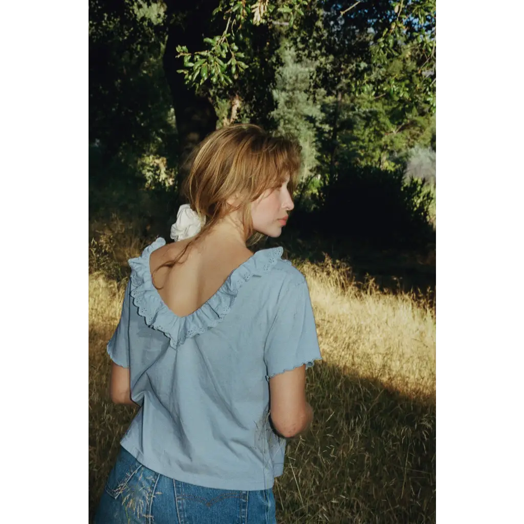 Light blue Cottage Tee with ruffled neckline and eyelet details