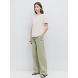 Woman in a casual linen outfit wearing The Deanna Top, ideal stylish womens clothes