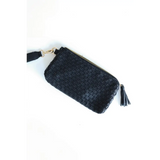 Black woven leather Devin Clutch with tassel zipper pull for the perfect combination of style