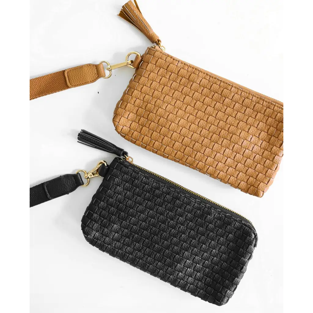 Woven leather Devin Clutch in solid black with tassel zipper pulls for style and function