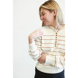 Cream-colored Ellen Henley Sweater with brown stripes and stylish decorative buttons