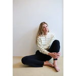 Green Ellen Henley Sweater with stripes, black leggings, beige buttons