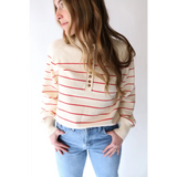 Cream-colored Ellen Henley Sweater with red stripes, perfect for peace signs camp vibes