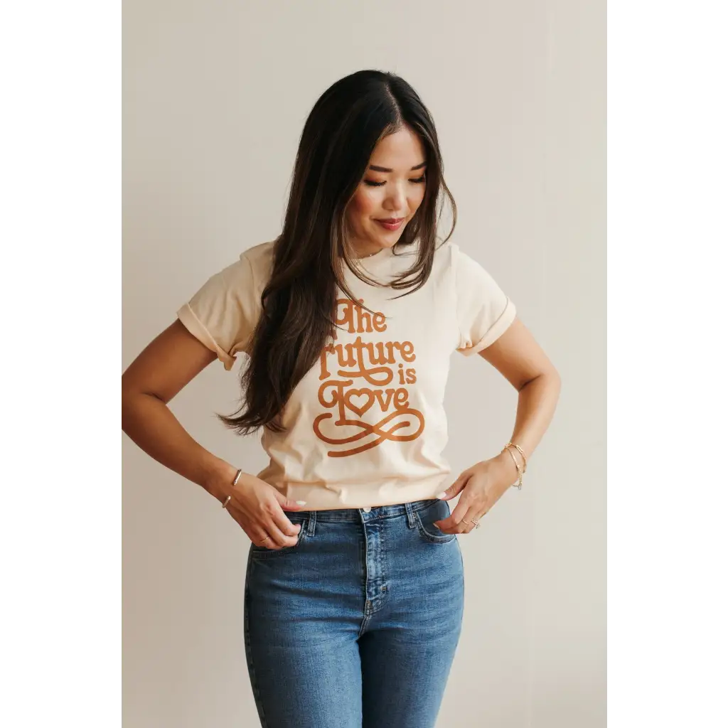 Cream Love Graphic T-shirt featuring retro orange text and polished prints, stylish womens clothes