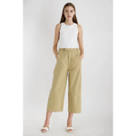 Woman in The Ivette Basic Tank, pairing it with khaki culottes for stylish womens clothes