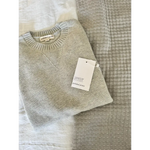 Light gray Margo Crew Neck Sweater with price tag showing ribbed details