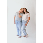 Two women in matching stylish mom crop boxy tees wearing The Mom Crop in Antique White