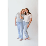 Two women in matching stylish mom crop boxy tees wearing The Mom Crop in Antique White