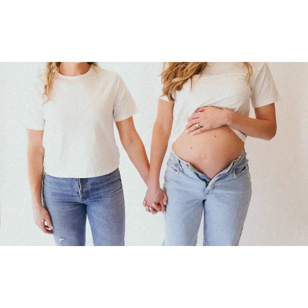 Pregnant woman holding hands in The Mom Crop boxy tee Stylish Mom Crop in Antique White