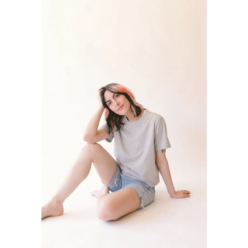 Woman in gray mom crop top and denim shorts from Stylish Womens Clothes collection