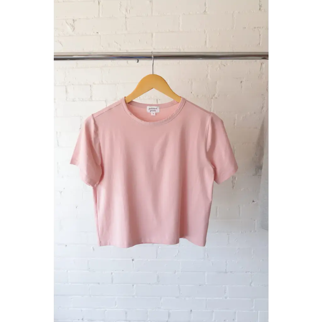 Pink short-sleeved T-shirt from The Mom Crop in Rose showcasing stylish womens clothes