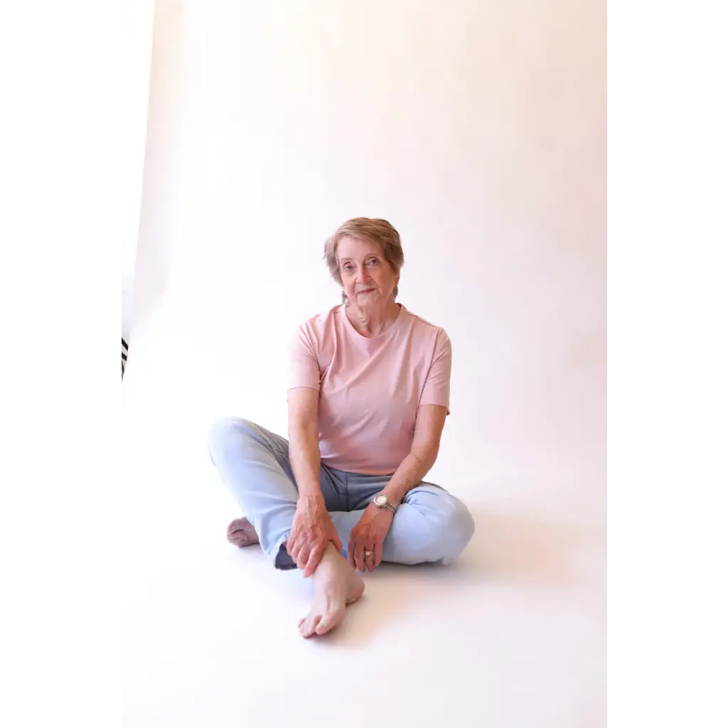 Elderly woman in casual stylish womens clothes wearing The Mom Crop in Rose with polished prints