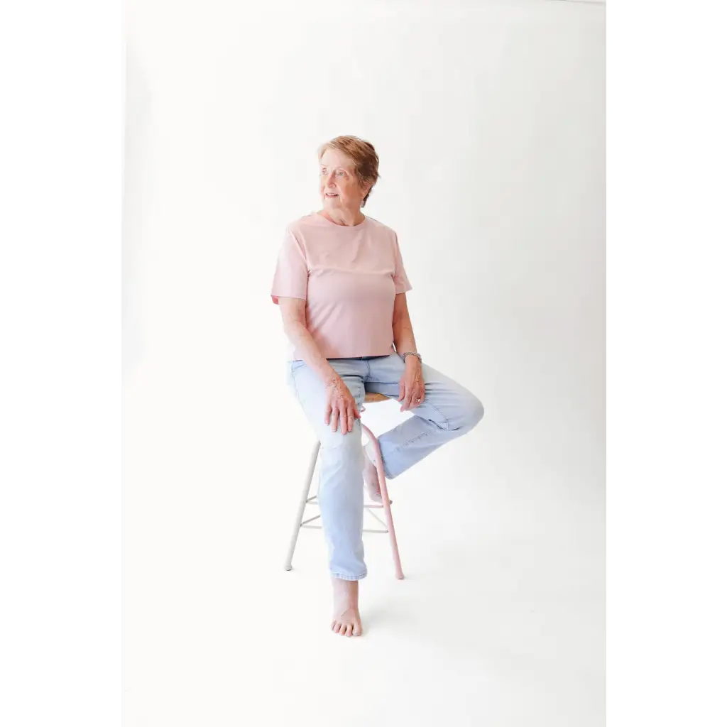 Elderly woman in stylish womens clothes wearing The Mom Crop in Rose with polished prints