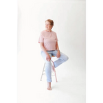 Elderly woman in stylish womens clothes wearing The Mom Crop in Rose with polished prints