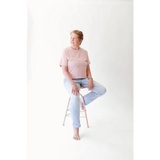 Elderly woman in stylish womens clothes wearing The Mom Crop in Rose with polished prints