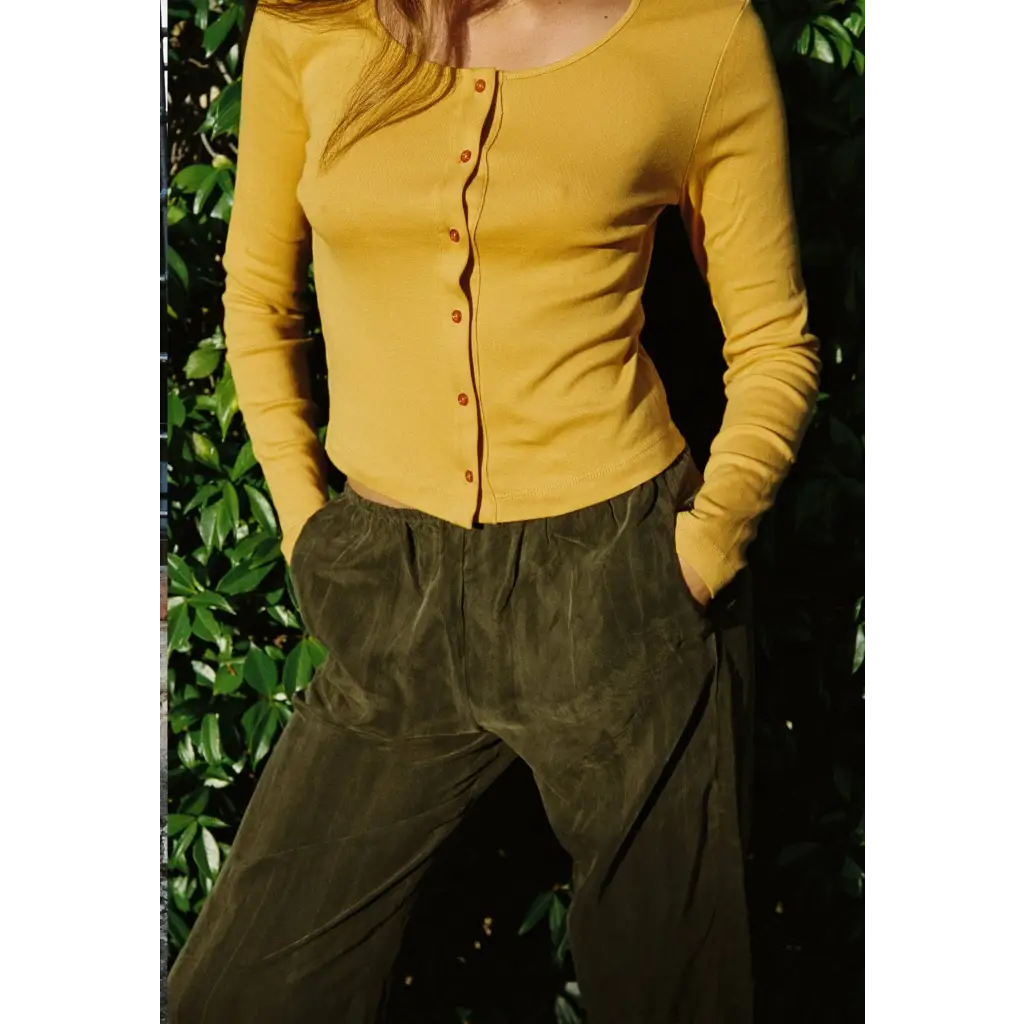 Mustard-yellow organic cotton baby rib cardigan with brown buttons