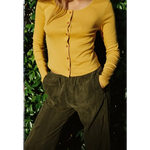 Mustard-yellow organic cotton baby rib cardigan with brown buttons