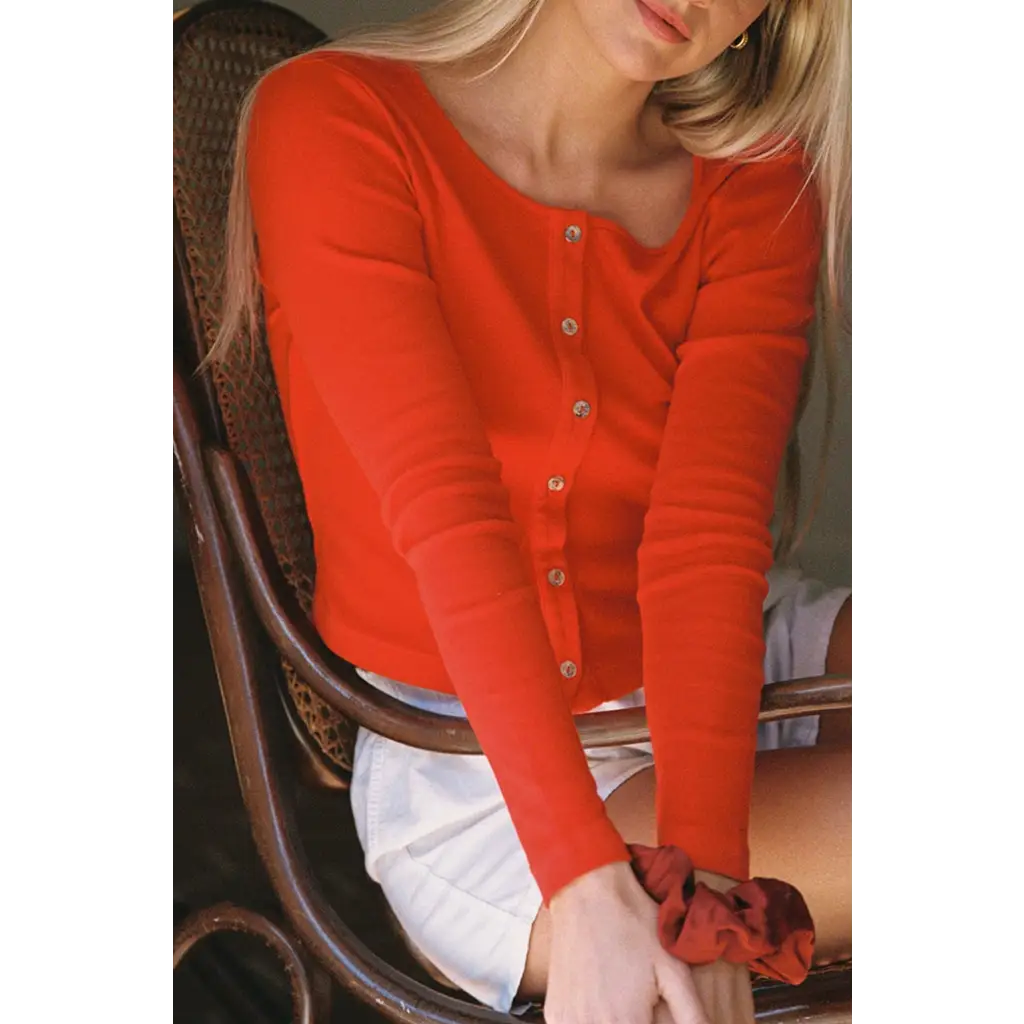 Vibrant orange organic cotton baby rib cardigan front view