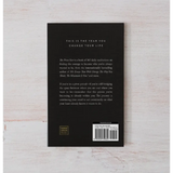 Black hardcover book with white text on back, Brianna Wiest’s Pivot Year from Polished Prints