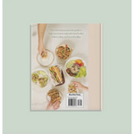 Back cover of Postpartum Nutrition Cookbook with delicious plated dishes and eager hands