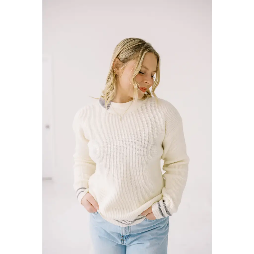 Cream-colored ribbed Sam Crew Neck sweater for a cozy season transition look