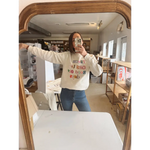 Cream-colored long-sleeved sweatshirt with good ole days reversed lettering