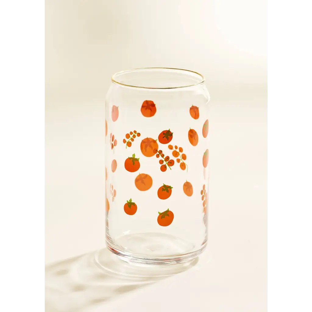 Clear glass tumbler with gold rim and orange berry print, perfect for stylish womens clothes