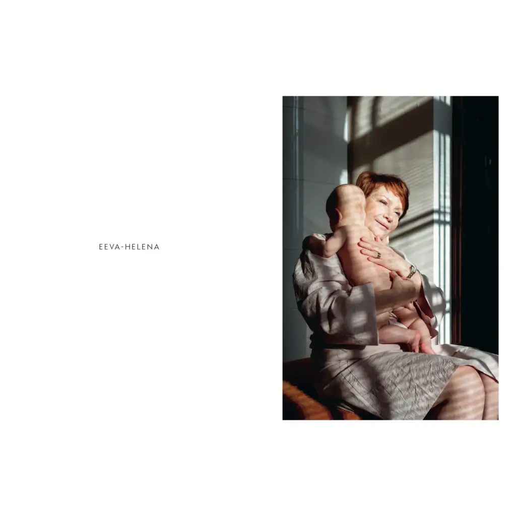 Woman with short red hair in stylish womens clothes holding infant, Traces Of Motherhood polished prints